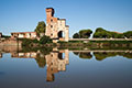 View of the Guelph Tower on the River Arno, Pisa, Italy 