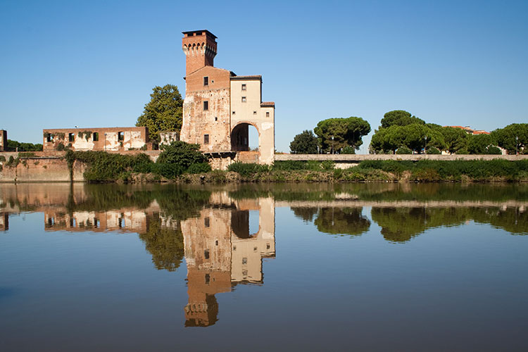 View of the Guelph Tower along the River Arno, Pisa, Italy